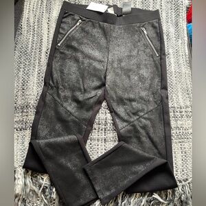 Woman leggings, voted on the front, fits small.